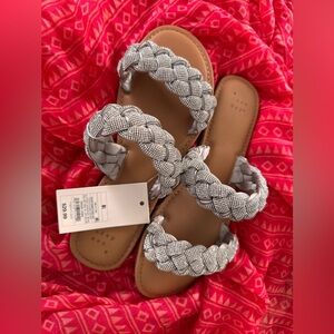 Silver rhinestone sandals.